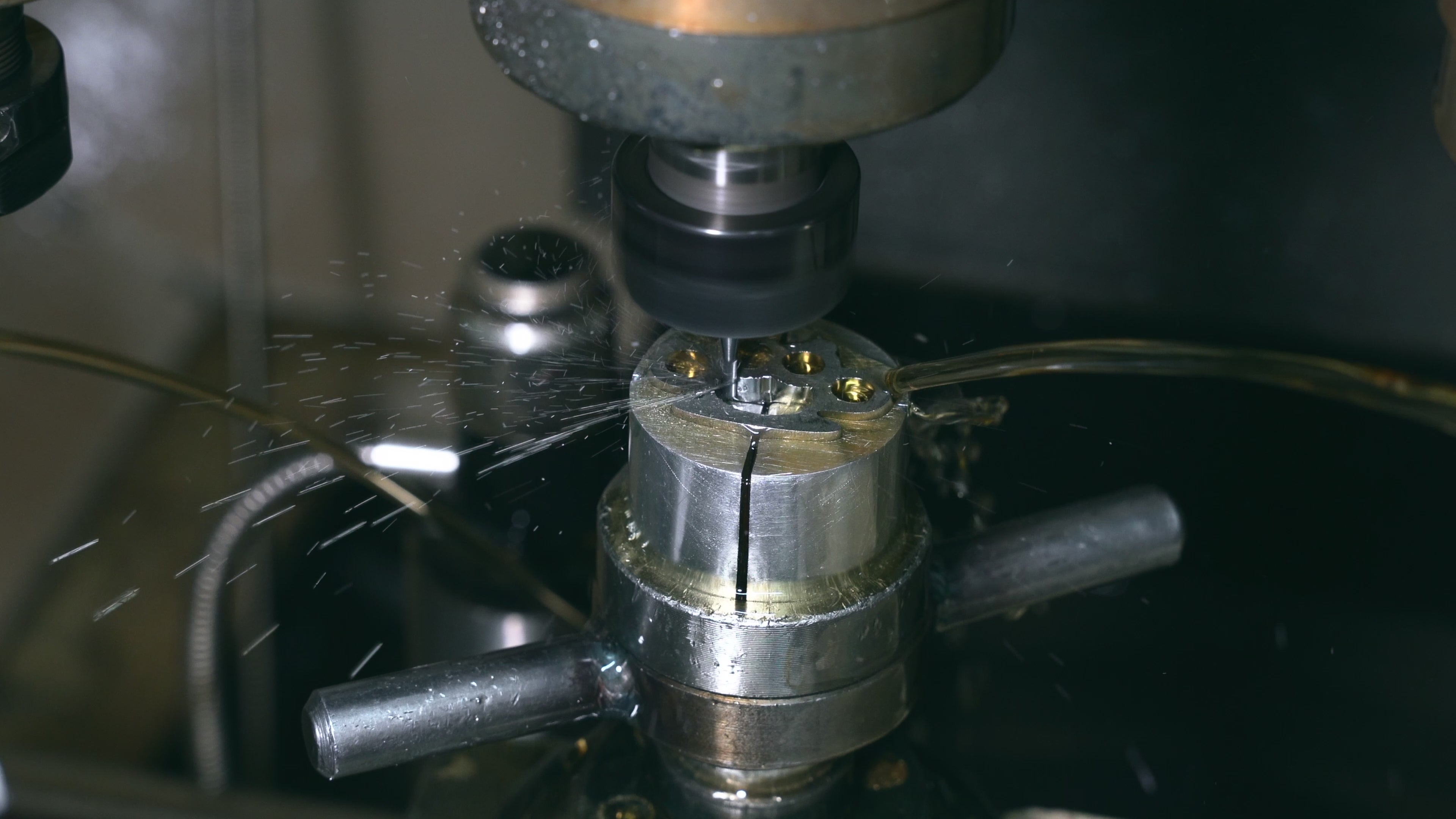 Load video: Golf ball marker being made with CNC machine